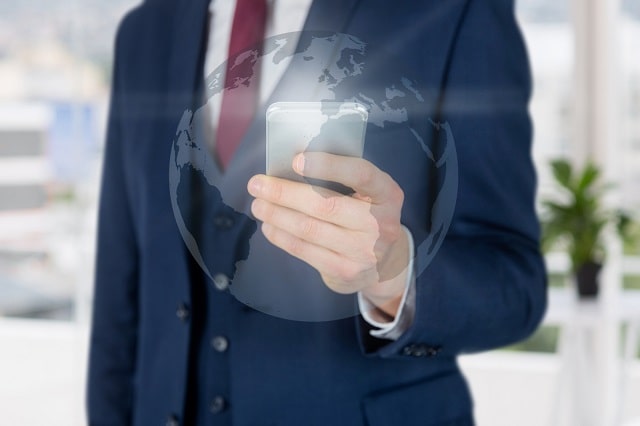 Person in suit with mobile global search overlay