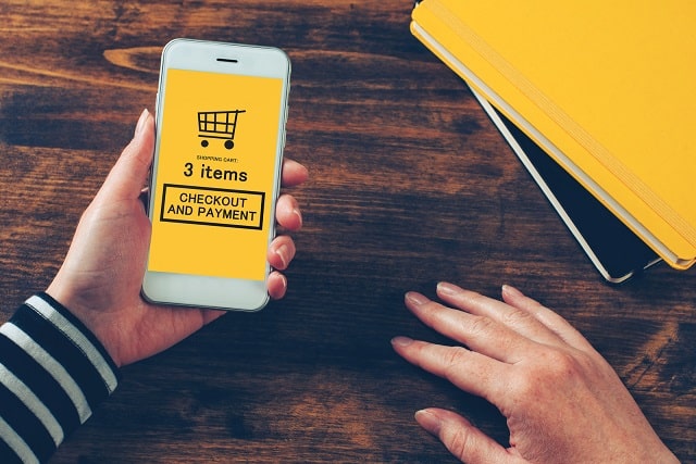 Mobile device with e-commerce checkout screen